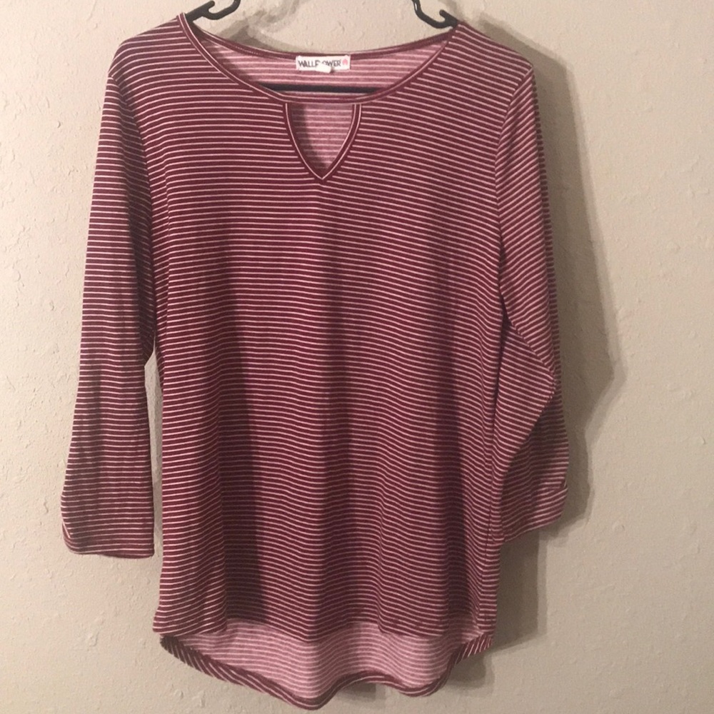 This is a long sleeve shirt with stripes